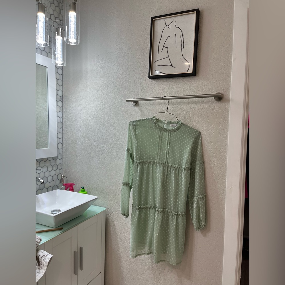 Sage green dress, lined and very light. Makes for a very cute summer dress